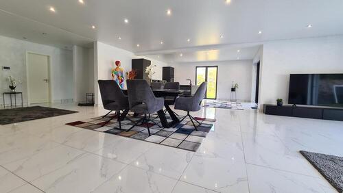Foto 10_Wohn-Esszimmer mit offener Küche - 