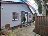 Foto 4_Hauseingang - Bungalow mit 101,00 m&sup2; in Lampertheim zum Kaufen