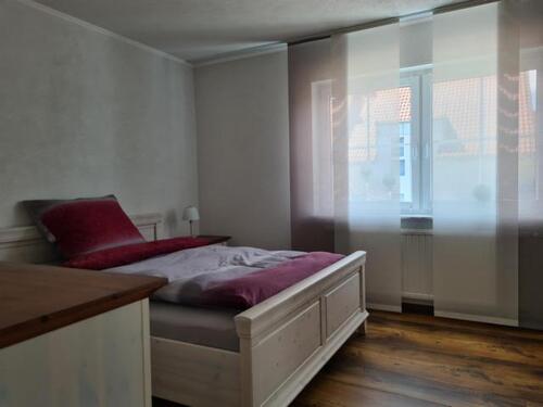Foto 13_Schlafzimmer 1 OG - 