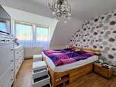 Foto 13_Schlafzimmer OG - 