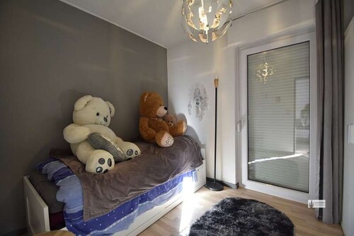 7 Schlafzimmer in der ELW mit Terrassentür - 