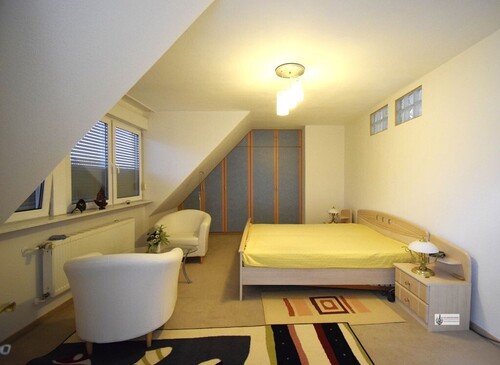 k-Schlafzimmer 3 mit Einbaukleiderschrank im OG - 