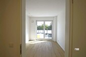 Schlafzimmer mit Tür zur Dachterrasse - 