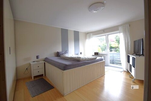 Schlafzimmer mit Balkon - 