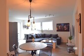 Blick ins Wohnzimmer - Etagenwohnung mit 65,75 m&sup2; in Weyhe zur Miete