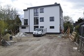 Neubau zum 1.7.26 bezugsfertig - Neubau mit Fertigstellung im Juli 2026 Hoch moderne EG Wohnung + Rollläden + Stellplatz ohne Küche