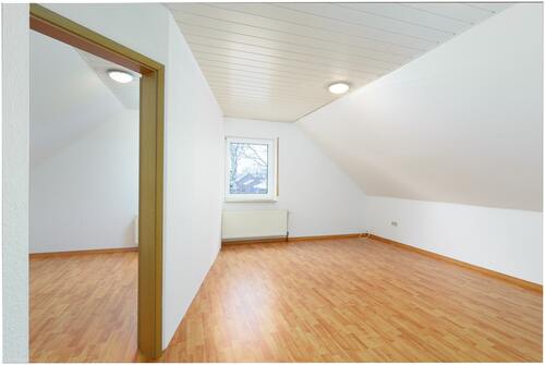 Wohnzimmer - 3 Zimmer Dachgeschoßwohnung in Ostrhauderfehn