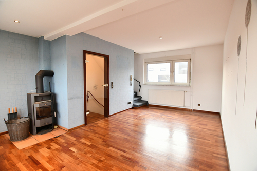 Wohnzimmer mit Kaminofen - 