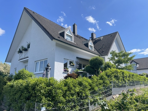 Hausansicht Gartenseite - moderne DHH mit ELW im 'Franzosenviertel'