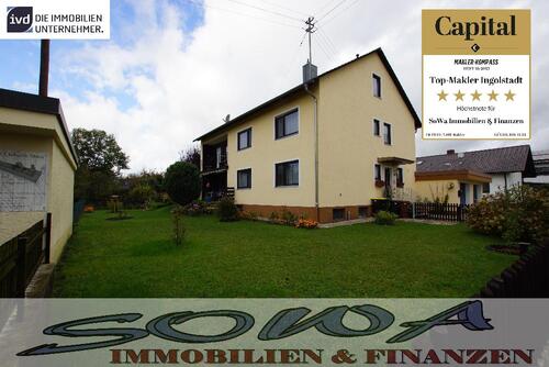 Foto - Schönes Zweifamilienhaus mit zwei Garagen aus einem großzügigen Grundstück - Ein Objekt von Ihrem Immobilienpartner SOWA Immobilien und Finanzen