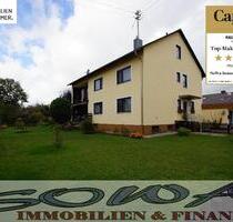 Schönes Zweifamilienhaus mit zwei Garagen aus einem großzügigen Grundstück - Ein Objekt von Ihrem Immobilienpartner SOWA Immobilien und Finanzen - Münchsmünster