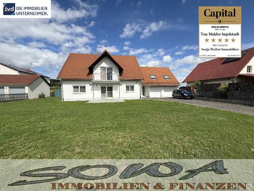 Foto - Einzugsbereites Zweifamilienhaus mit Keller, Doppelgarage und Wärmepumpe - Ein Objekt von SOWA Immobilien und Finanzen