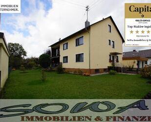 Schönes Zweifamilienhaus mit zwei Garagen aus einem großzügigen Grundstück - Ein Objekt von Ihrem Immobilienpartner SOWA Immobilien und Finanzen - Münchsmünster