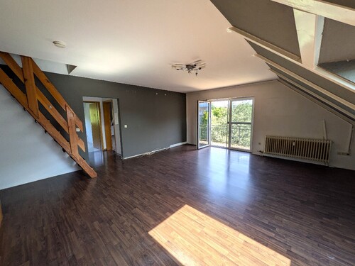 Wohnzimmer - 3 Zimmer Maisonettenwohnung zum Kaufen in Waghäusel