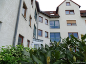 Hausansicht - Etagenwohnung mit 68,00 m² in Weinböhla zum Kaufen