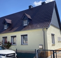 Gemütliche Doppelhaushälfte mit großem Grundstück und Doppelgarage in ruhiger Siedlungslage - Röderaue