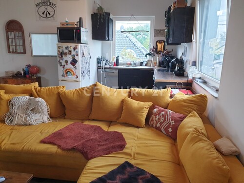 Wohnzimmer mit Blick in die Küche - 2 Zimmer Etagenwohnung zur Miete in Dortmund