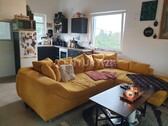 Wohnzimmer mit Blick in die Küche - 2 Zimmer Etagenwohnung in Dortmund