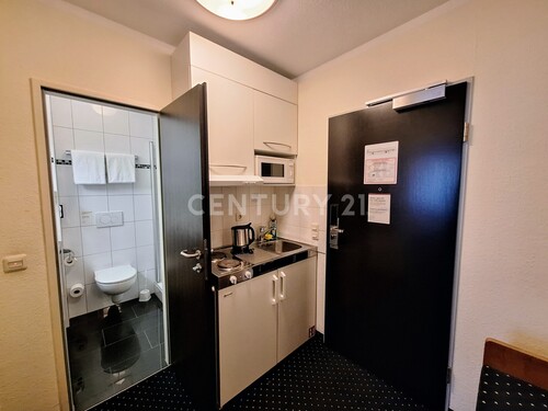 Eingangsbereich und Kochnische - Hotel, Pension, Gasthof mit 23,68 m² in Bochum zum Kaufen