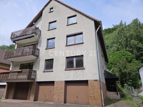 Frontansicht vom Garagenhof - Attraktive Kapitalanlage mit Potenzial: Mehrfamilienhaus mit 6 Eigentumswohnungen & Garagen in Hemer