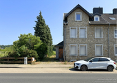 Ansicht Front - JÄSCHKE - Zweifamilienhaus mit großem Grundstück: Entwicklungschance in Stolberg Mausbach