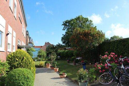 Gartenansicht mit Fahrradabstellmöglichkeit - 1 Zimmer Etagenwohnung in Münster