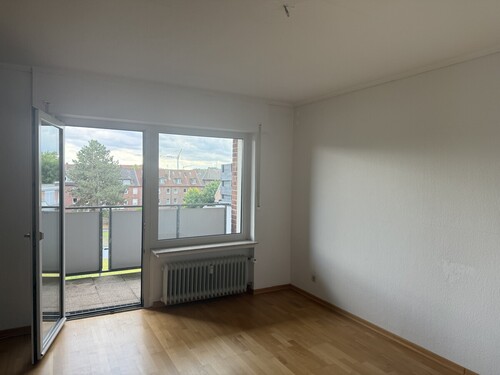 Schlafzimmer mit Balkon zum Innenhof - Dachgeschoßwohnung mit 60,55 m&sup2; in Münster zur Miete