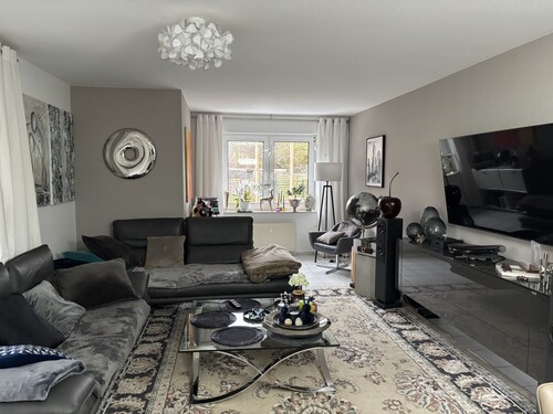 Wohnzimmer mit Erker - Erdgeschoßwohnung mit 83,77 m&sup2; in Münster zum Kaufen