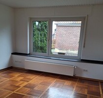 Greven-Gimbte: Helle Erdgeschosswohnung mit Terrasse!