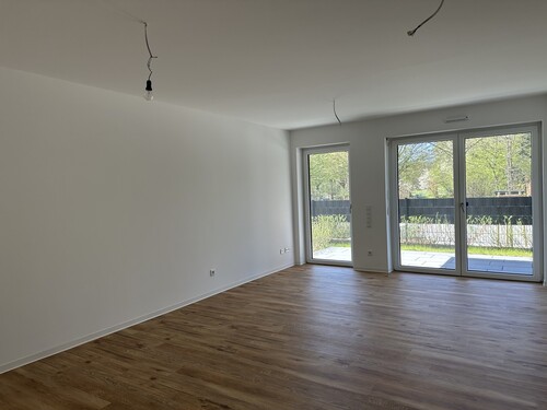 Wohnzimmer mit Blick zur Terrasse - 3 Zimmer Erdgeschoßwohnung zum Kaufen in Telgte