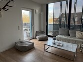 Wohnzimmer - Urbaner Wohntraum: Stilvolle Maisonette-Wohnung mit großzügiger Dachterrasse in Münster!