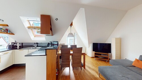 Blick in den Wohn- und Essbereich - 2 Zimmer Dachgeschoßwohnung zum Kaufen in Norderney