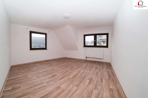 Wohnzimmer - 3- Zimmerwohnung mit 53,12 m² in Bad Wildbad zum Kaufen