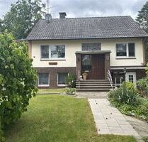 Einfamilienhaus mit Einliegerwohnung in Waldrandlage, ideale Kombination aus Wohnen und Rendite - Steyerberg