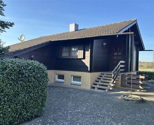 Charmantes Blockbohlenhaus mit Sonnenterrasse mit tollem Weitblick u. einer beheizbaren Vollkeller. - Steyerberg