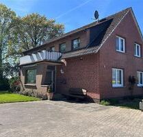 Interessantes Wohnhaus mit 2 Wohnungen, Nebengebäude und Grünland - Stolzenau