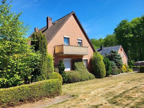 seitliche Ansicht - 9 Zimmer Mehrfamilienhaus, Wohnhaus in Marklohe