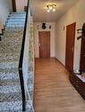 Flur EG mit Treppenhaus - 7 Zimmer Mehrfamilienhaus, Wohnhaus zum Kaufen in Steyerberg