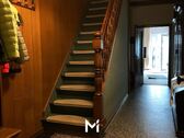  Treppenaufgang in die Obergeschosswohnung - 
