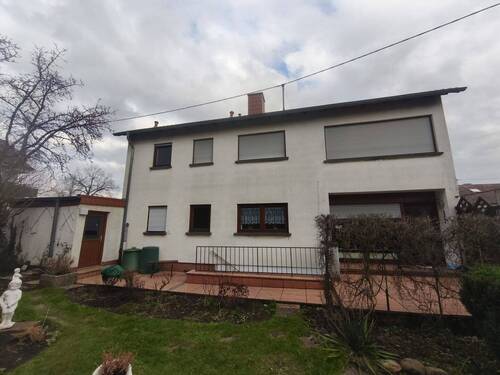 Rückansicht.jpeg - 6 Zimmer Mehrfamilienhaus, Wohnhaus in Schiffweiler