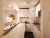 Küche mit Durchreiche - Erdgeschoßwohnung mit 42,00 m² in München zum Kaufen