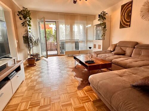 Wohnzimmer - 4 Zimmer Erdgeschoßwohnung zum Kaufen in Putzbrunn