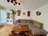 Wohnzimmer - 4 Zimmer Erdgeschoßwohnung in Putzbrunn