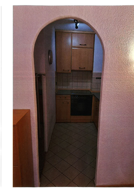 Blick vom Wohnzimmer in die Küche - Etagenwohnung mit 42,00 m&sup2; in München zum Kaufen