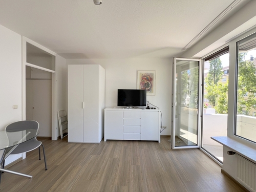 Wohnraum - 1 Zimmer Etagenwohnung in München