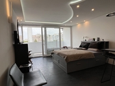 Wohnraum - 1 Zimmer Etagenwohnung in München