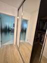 Blick zur Ankleide und Bad EG - 