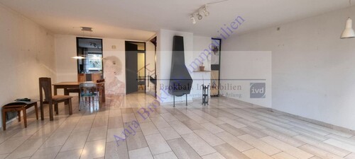 Wohnzimmer mit Kaminofen - 