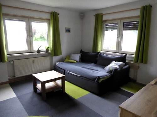 Wohnzimmer Erdgeschoss - 6 Zimmer Zweifamilienhaus zum Kaufen in Hirschaid