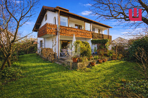 Außenansicht - WINDISCH IMMOBILIEN- Sehr gepflegte DHH in ruhiger, familienfreundlicher Lage von Puchheim!